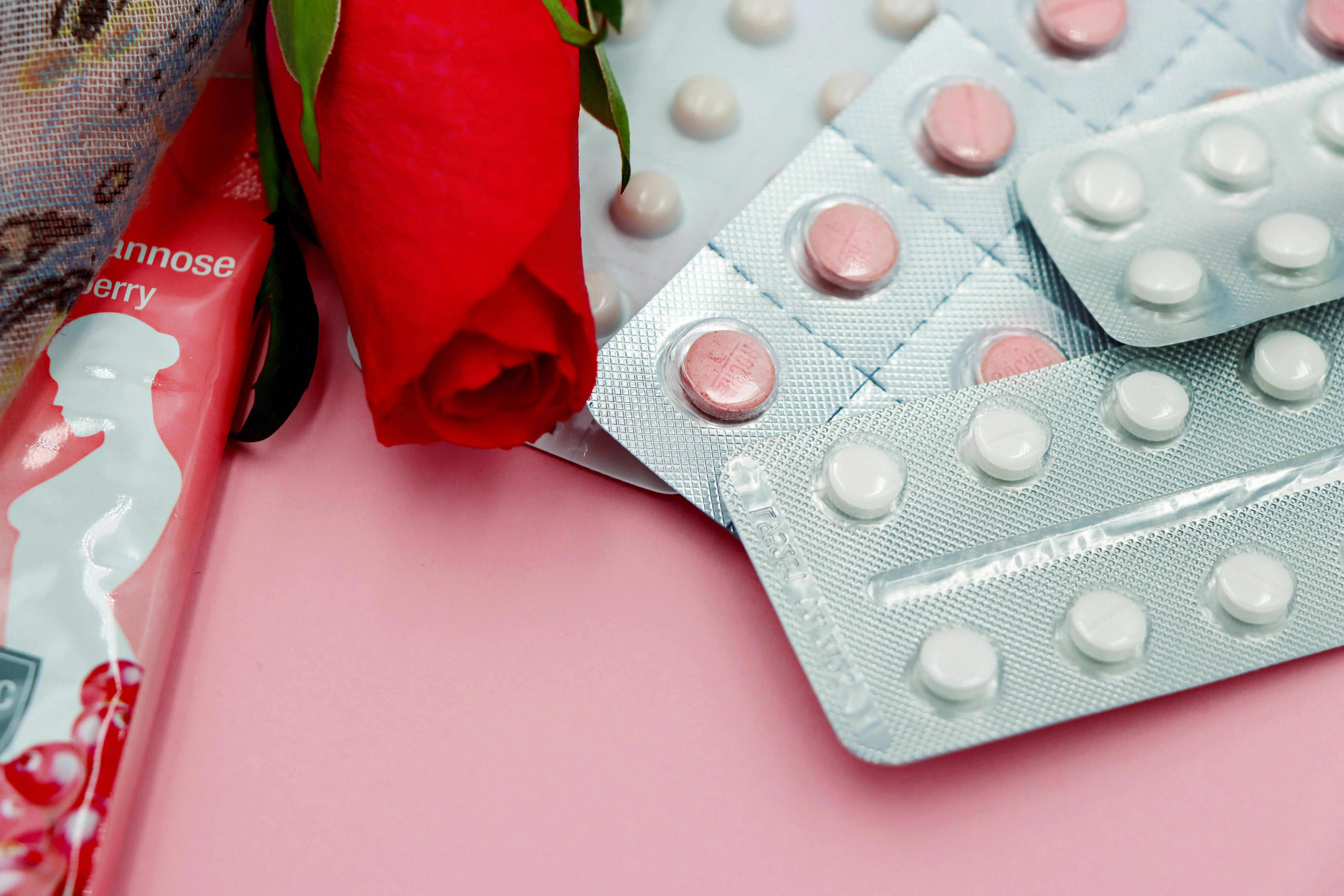 close up photo of different blister packages of contraceptive pills